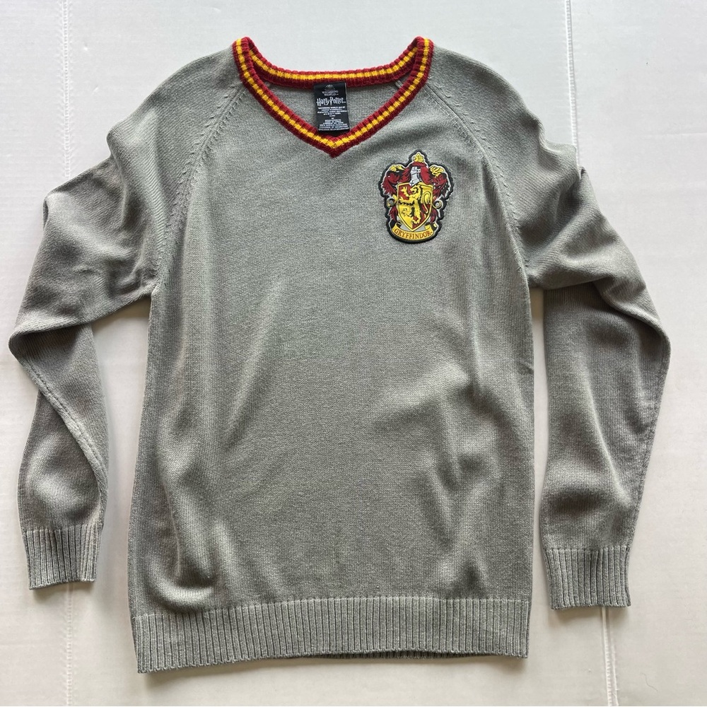 Warner Bros. Gray V-Neck Sweater with Red and Gold Trim and Gryffindor Crest